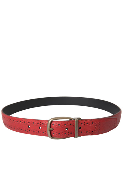 a red belt with holes and a metal buckle