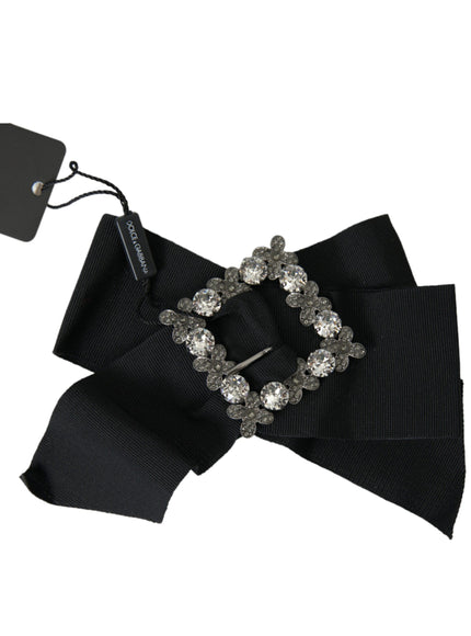 a close up of a black bow tie