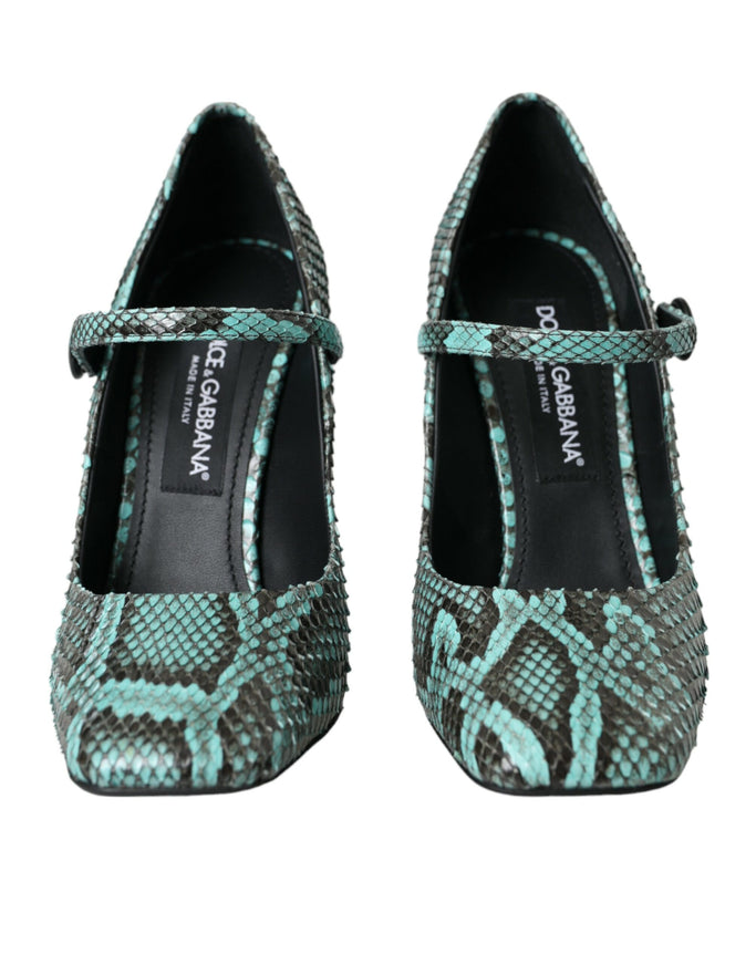 a pair of green and black snakeskin shoes