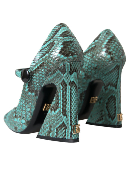 a pair of high heeled shoes with a snake skin pattern