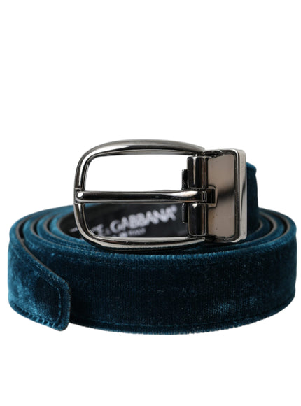 a blue velvet belt with a metal buckle