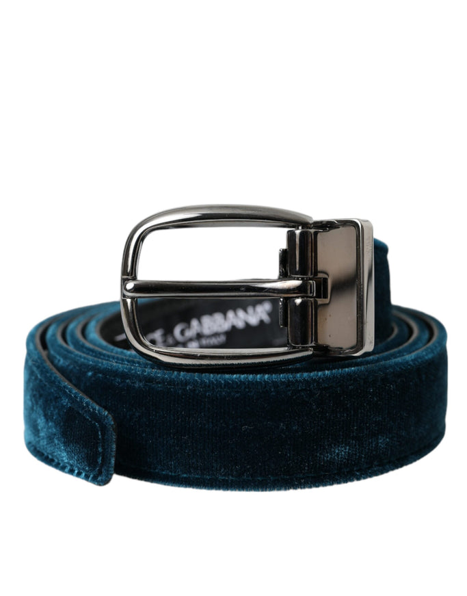 a blue velvet belt with a metal buckle