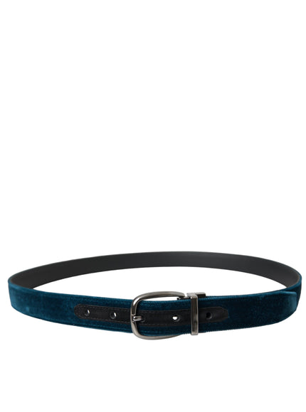 a blue velvet belt with a metal buckle