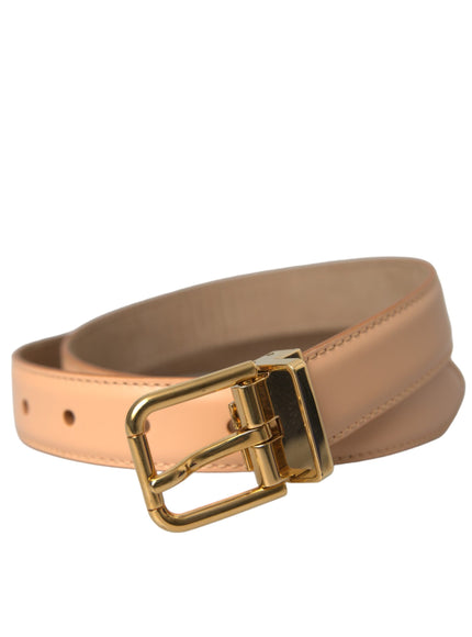 a tan belt with a gold buckle on a white background