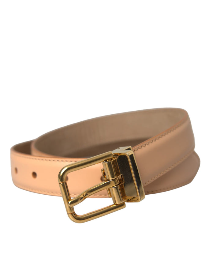 a tan belt with a gold buckle on a white background