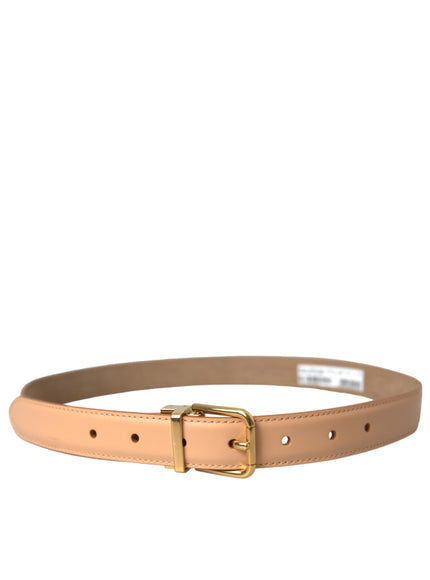 a tan leather belt with a gold buckle