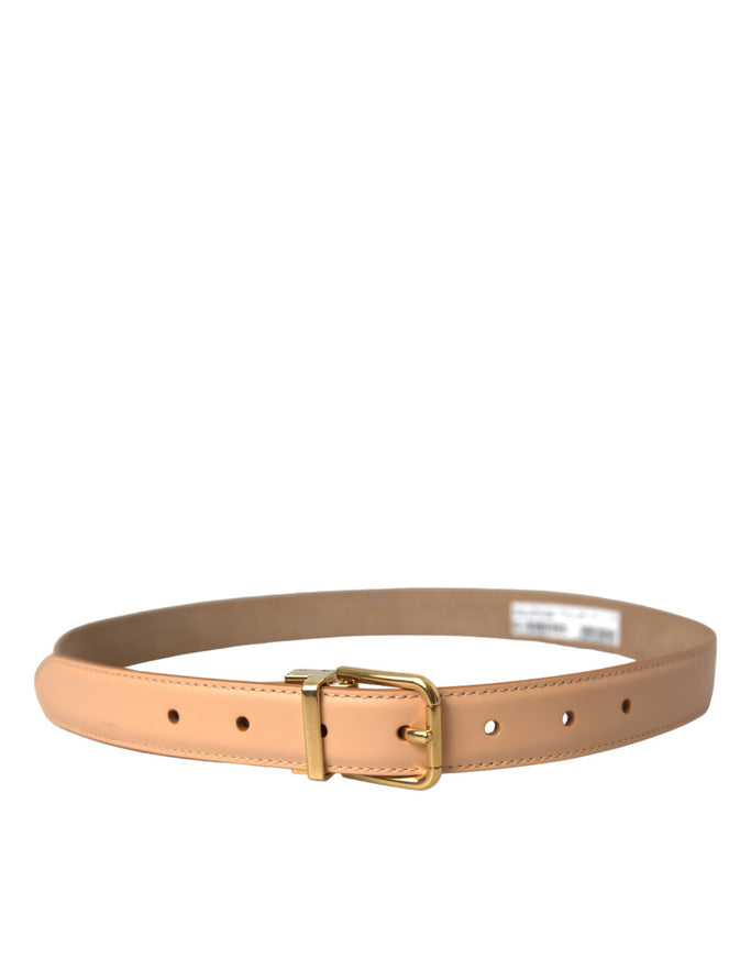 a tan leather belt with a gold buckle