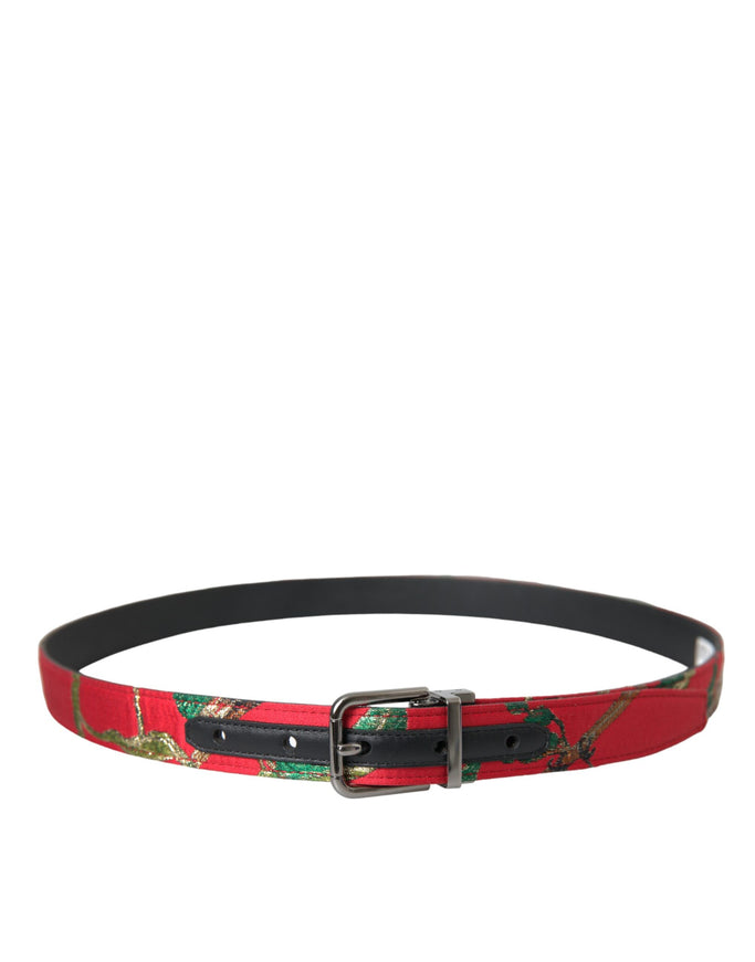 a red belt with a black buckle on a white background