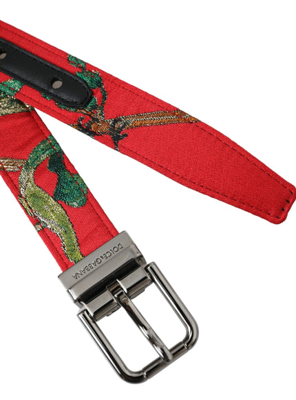 a red belt with a dragon design on it