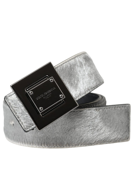 a silver belt with a black square buckle