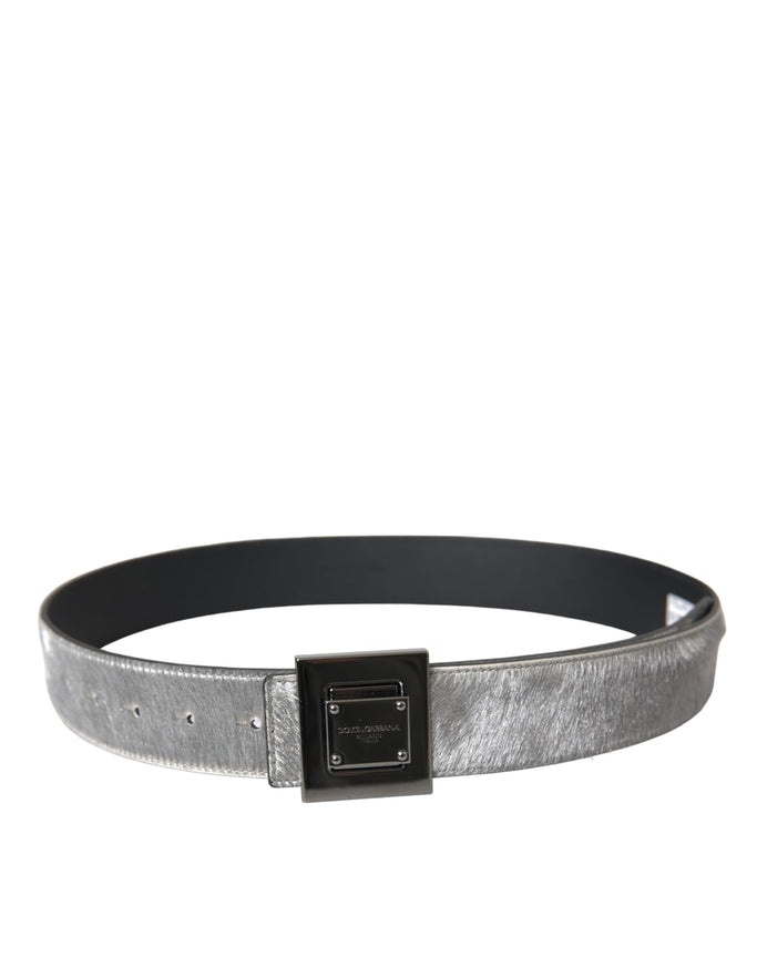 a silver belt with a black buckle