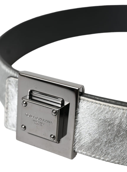 a close up of a belt with a metal buckle