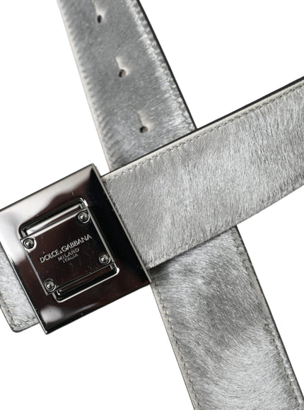 a silver belt with a square buckle on it