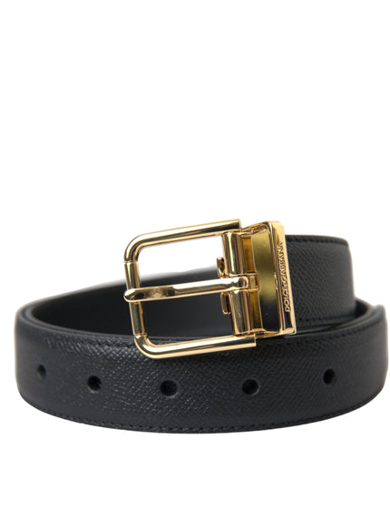 a black leather belt with a gold buckle