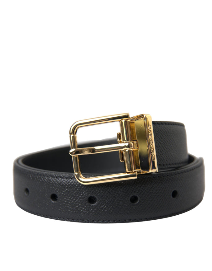 a black leather belt with a gold buckle