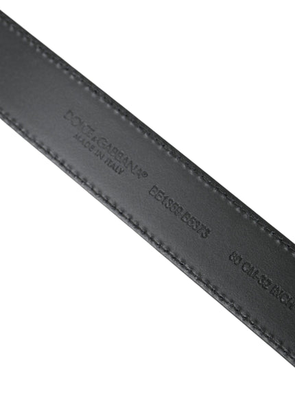 a close up of a black belt on a white background