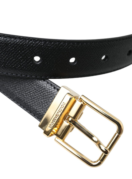 a black belt with a gold buckle