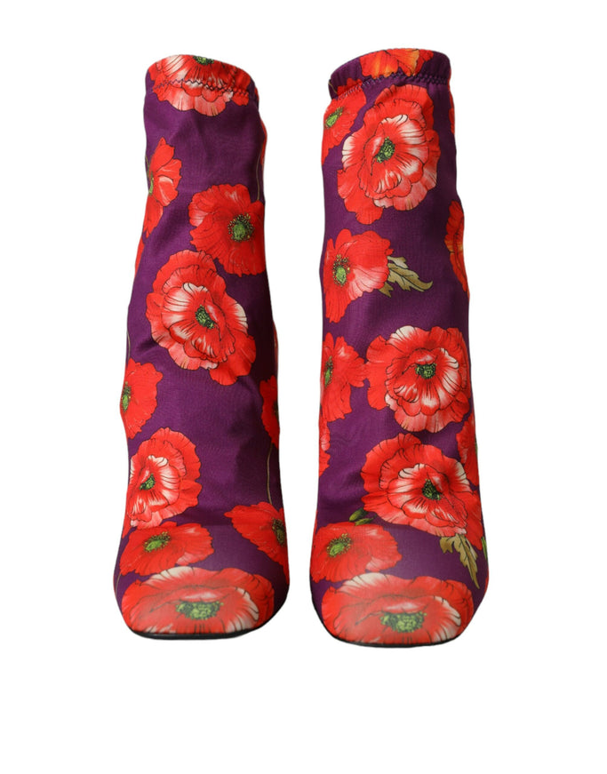 a pair of purple and red boots with red flowers on them