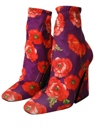 a close up of a pair of shoes with flowers on them