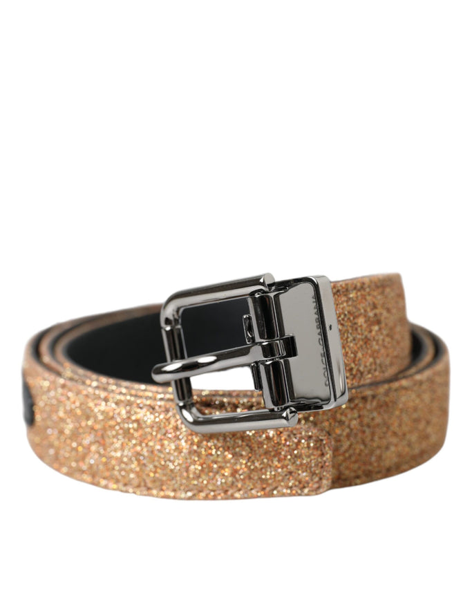 a gold glitter belt with a metal buckle