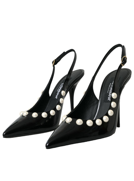 a pair of black high heels with pearls