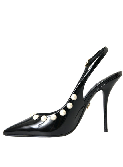 a pair of black high heels with pearls