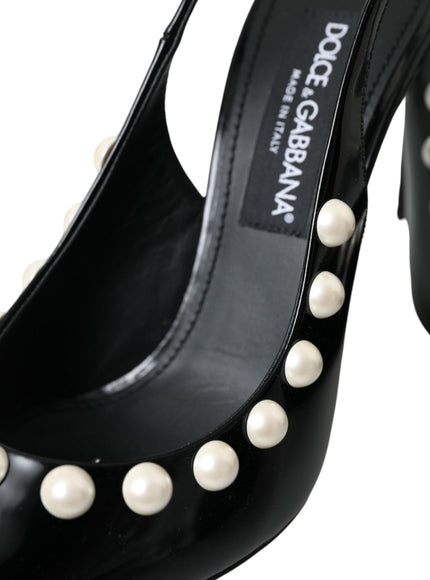 a pair of black high heels with pearls