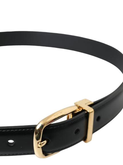 a black leather belt with a gold buckle