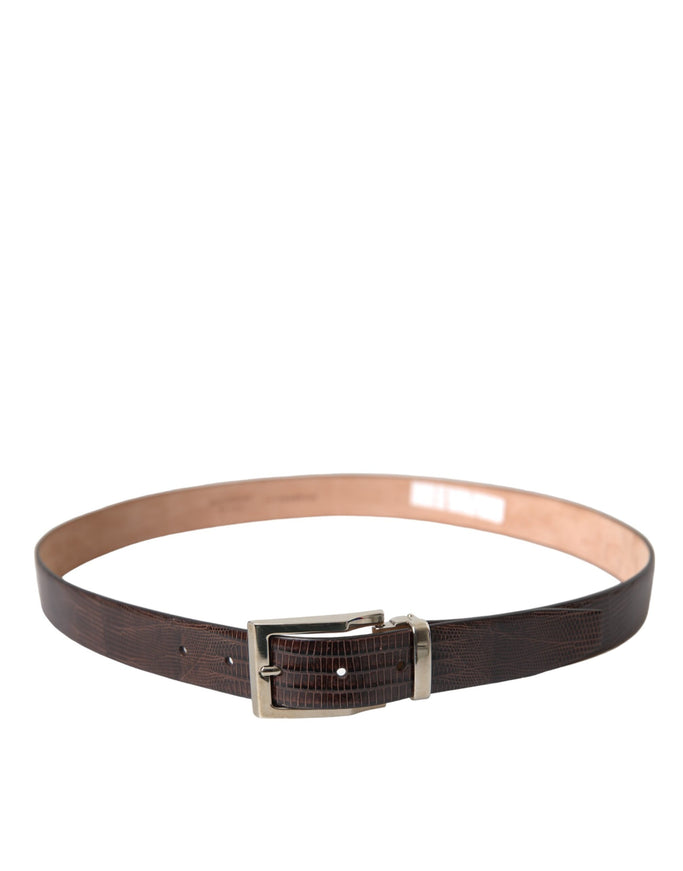 a brown belt with a silver buckle on a white background