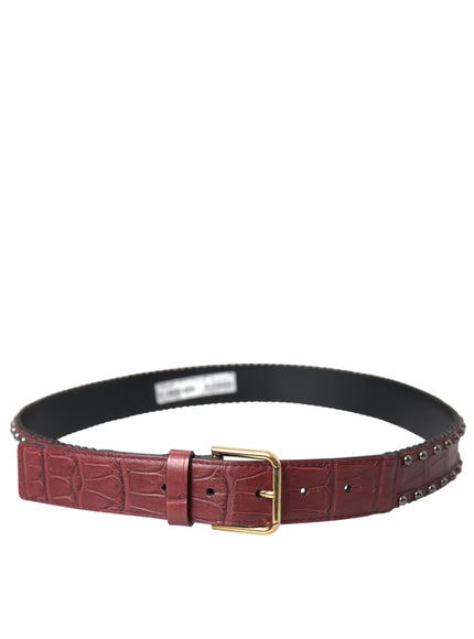 a women's leather belt with a gold buckle