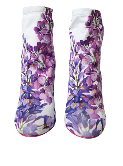 a pair of boots with purple flowers painted on them