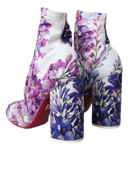 a pair of shoes with purple flowers on them