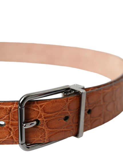 a brown belt with a metal buckle