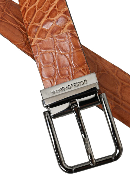 a brown belt with a metal buckle