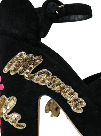 a pair of black high heels with gold sequins