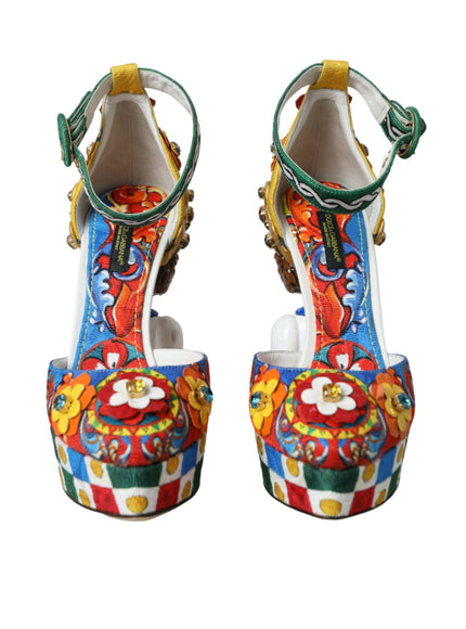 a pair of colorful high heeled shoes on a white background