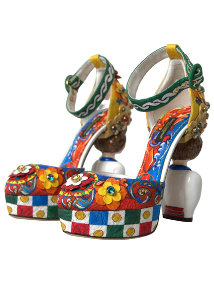 a pair of colorful high heeled shoes with flowers on them