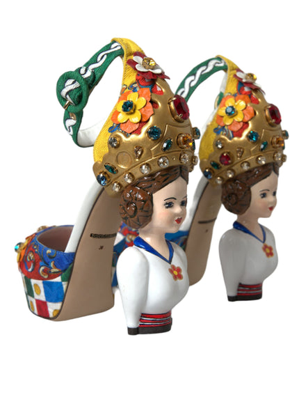 two figurines of women wearing high heel shoes