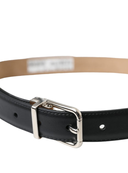 a black leather belt with a silver buckle