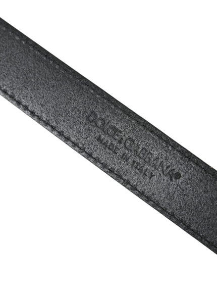 a close up of a black belt on a white background