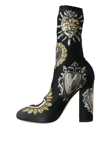 a high heeled shoe with a heart and sun design