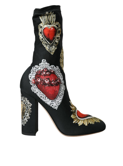 a pair of high heeled shoes with hearts on them