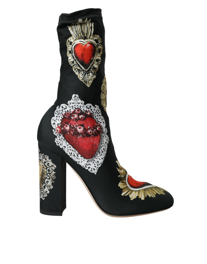 a pair of high heeled shoes with hearts on them