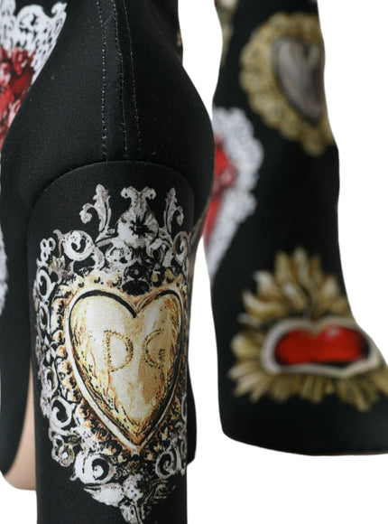 a close up of a pair of shoes with hearts on them