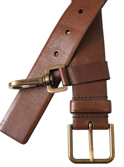 a brown leather belt with a gold buckle