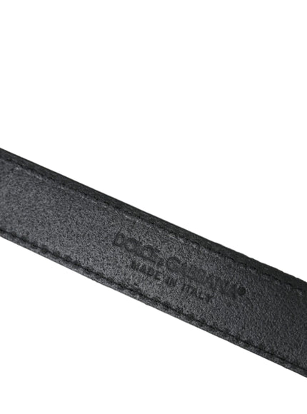 a close up of a black belt on a white background