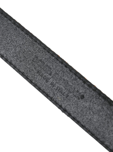 a close up of a black belt on a white background