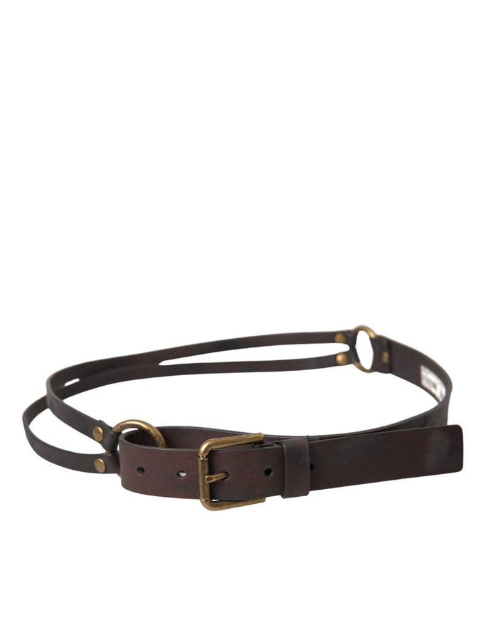 a brown leather belt with gold buckles