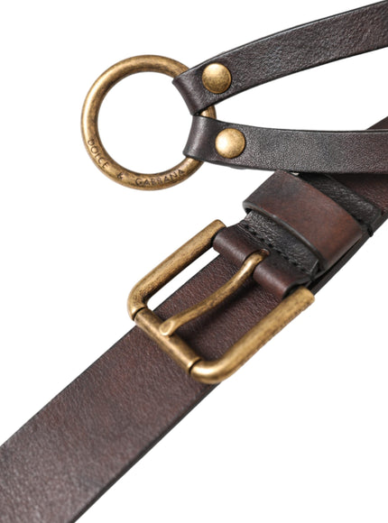 a brown leather belt with a gold buckle