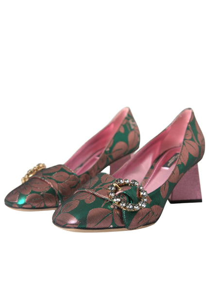 a pair of green and brown shoes with a flower on the heel